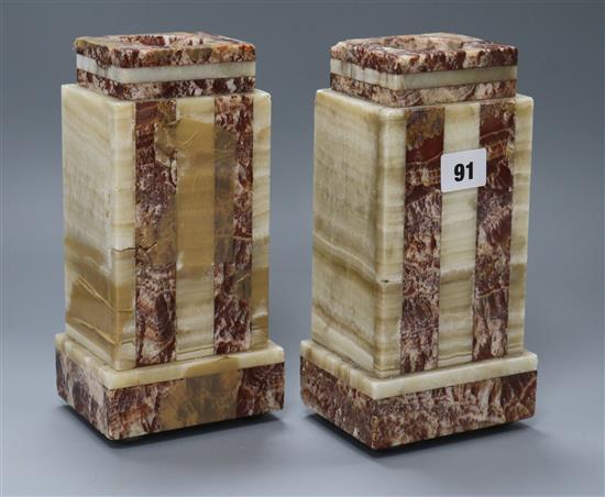 A pair of marble garnitures height 23cm